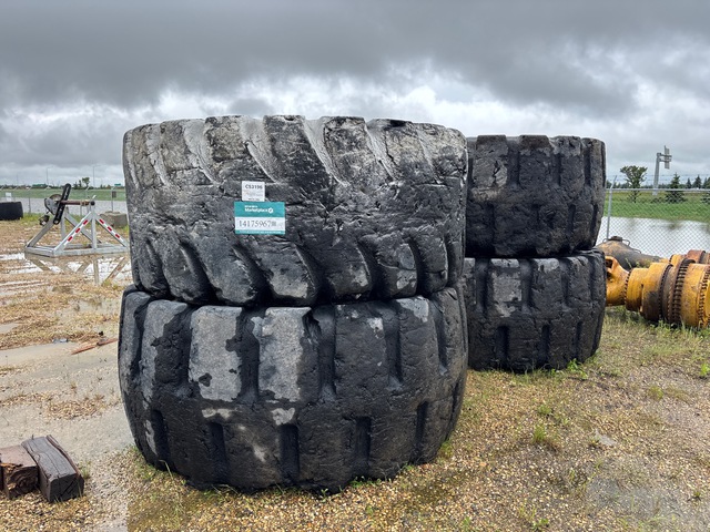 Quantity of (4) 45/65-45 Tires - Fits Cat 992C