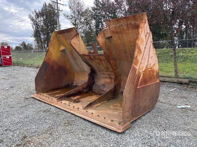 Cat 136 in Wheel Loader Bucket