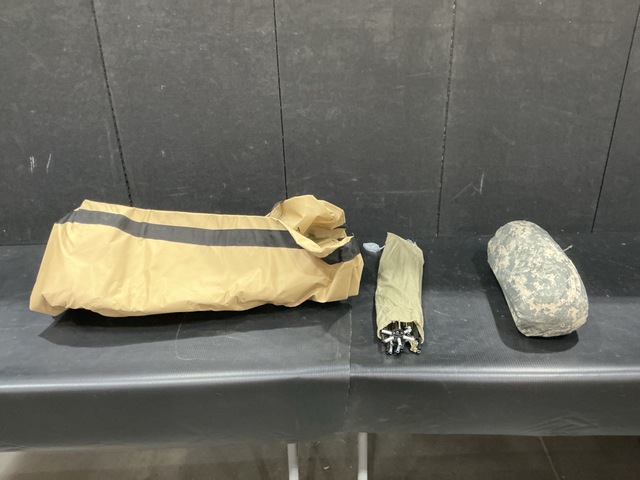 (12) Tent Bags, (11) ICS Improved Combat Shelters & Assorted Items