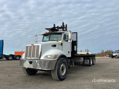 2006 Peterbilt 335 6x4 平台トラック