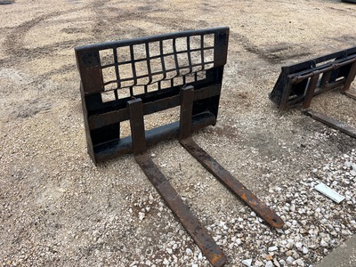 Cat 44 in Skid Steer Forks