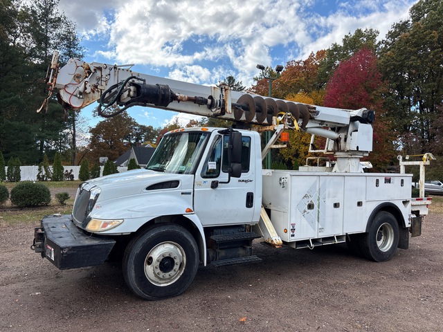 Altec DM47TR on 2012 International 4300 4x2 Digger Derrick Truck