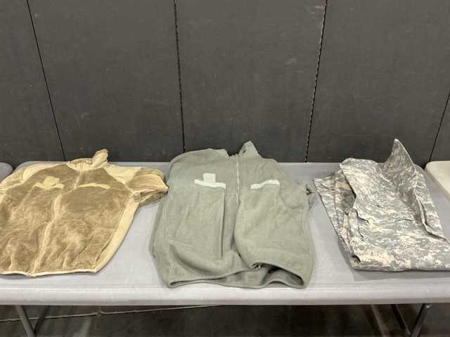 (1) Parka Liner, (81) Cold Weather Jackets, (8) Pairs of Trousers