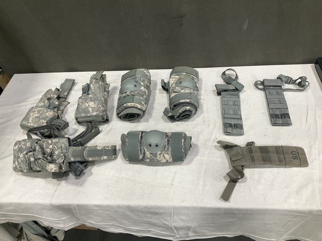 (42) Pistol Holsters, (8) Pairs of Elbows & Assorted Items (42) Pistol Holsters, (8) Pairs of Elbows & Assorted Items