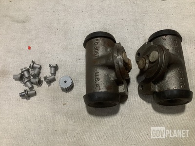 (1) Knob, (9) Nut & Bolt Retainers, (2) Cylinder Assemblies & Assorted Items