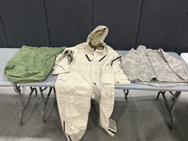 (2) Pairs of Fuel Handler's Coveralls, (2) Camouflage Jackets & Assorted Items