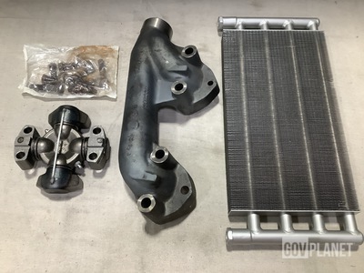 (2) Universal Joint Parts Kits, (6) Exhaust Manifolds & Assorted Items