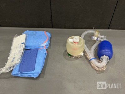 (2) Surgical Gowns, (1) U-Drape & (3) Resuscitators