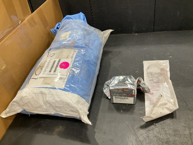 (2) Cases of Infusion Sets, (8) Surgical Packs, (1) Ammeter & Assorted Items (2) Cases of Infusion Sets, (8) Surgical Packs, (1) Ammeter & Assorted Items