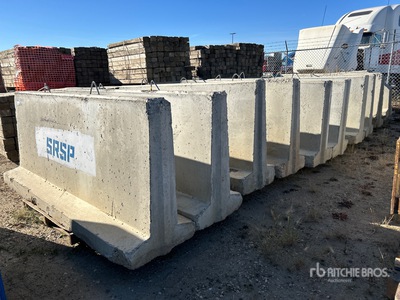 Quantity of (10) 8 ft Jersey Barriers