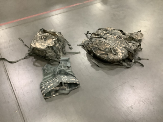 (34) Fighting Load Carriers, (10) Large Field Packs & Assorted Items