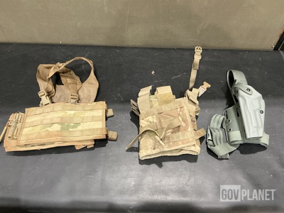 (34) Pistol Holsters, (35) Tactical Assault Panels, (1) Strap & Assorted Items