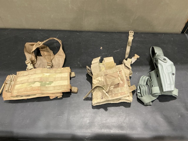 (34) Pistol Holsters, (35) Tactical Assault Panels, (1) Strap & Assorted Items