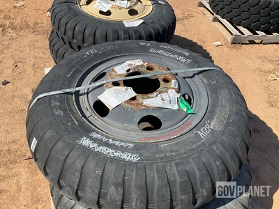 (2) STA 9.00-20 Tires w/Wheels & (2) Titan 9.00-20 Tires w/Wheels