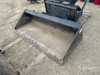 Cat 74 in Skid Steer Bucket