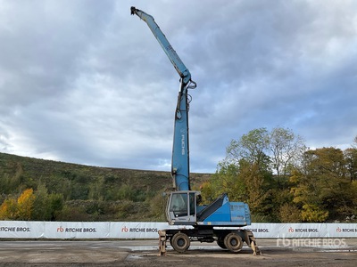 2015 Fuchs MHL350 Manipuladora de material con ruedas