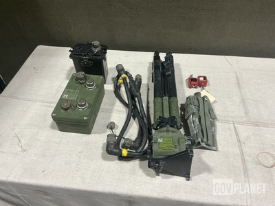 (2) Vehicle Power Adapter Assemblies, (9) Pistol Holsters & Assorted Items