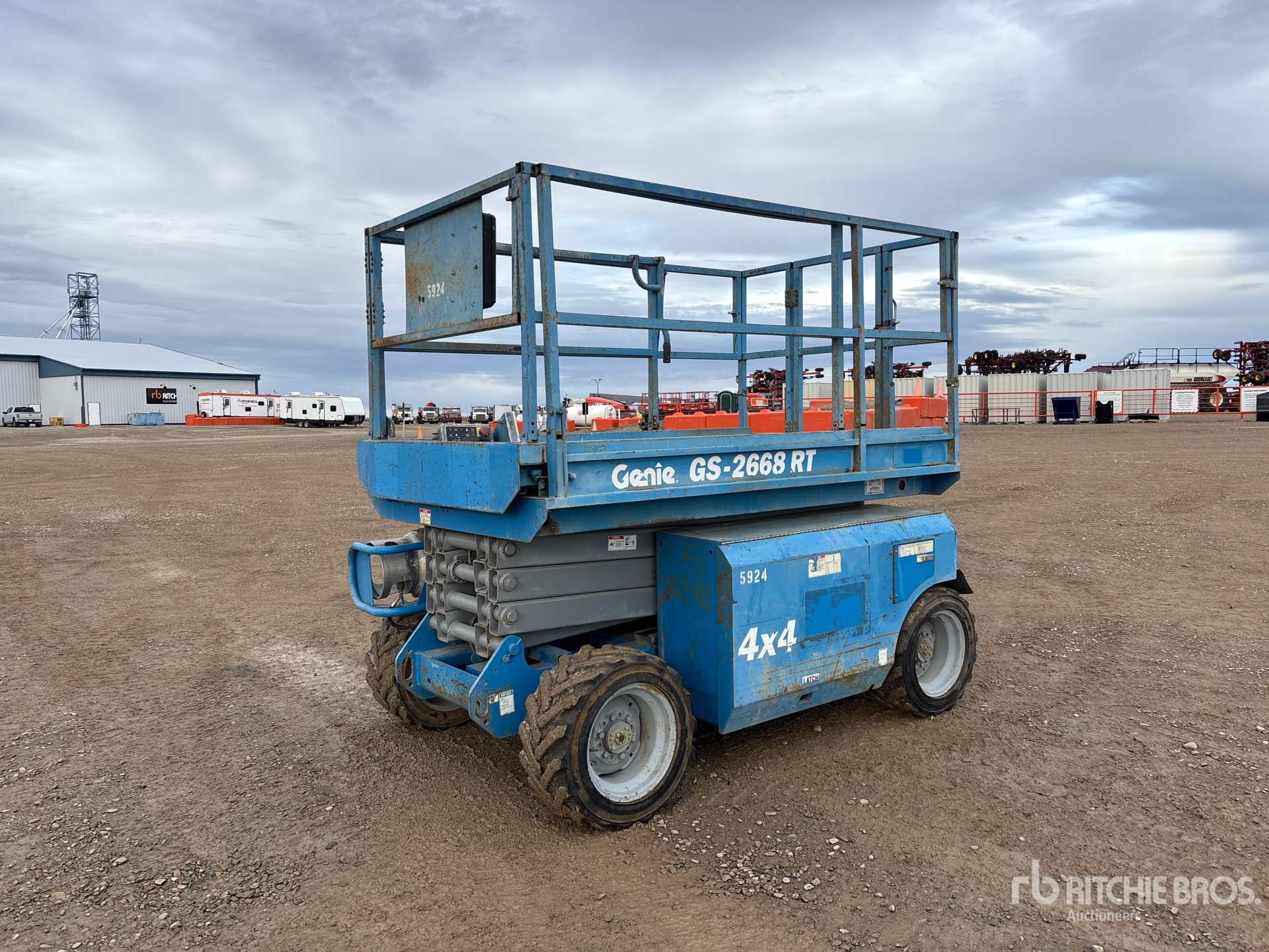 2002 Genie GS-2668RT 4x4 Dual Fuel Ascenseur à ciseaux