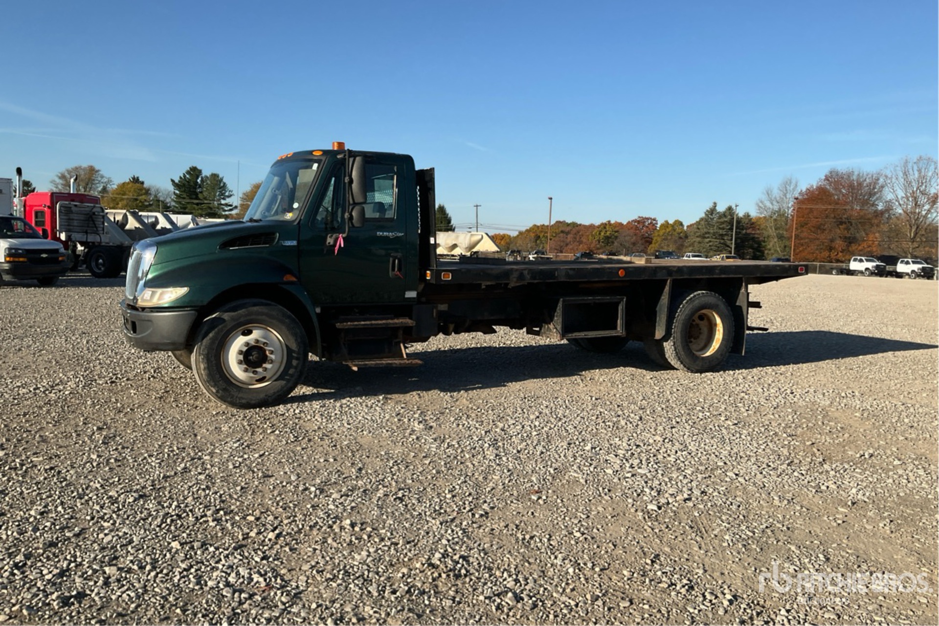 2013 International 4300 4x2 Flatbed Dump Truck