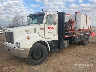 1999 Peterbilt 330 4x2 Flatbed Truck
