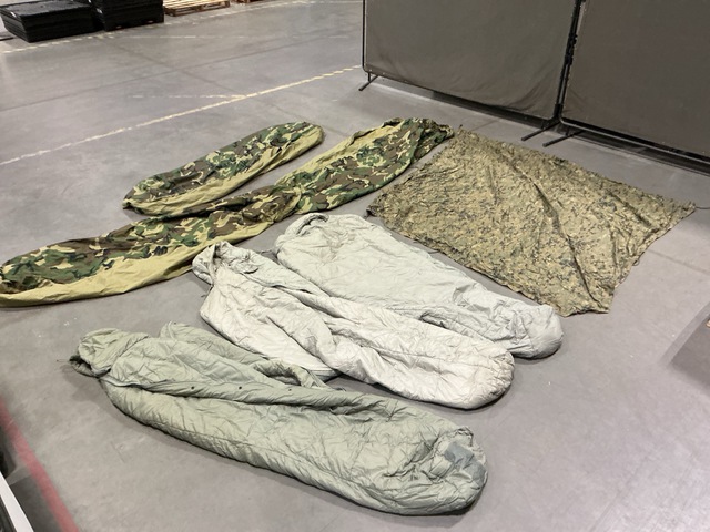 (9) Sleeping Bags, (30) Tarpaulins, (3) Bivy Covers & Assorted Items