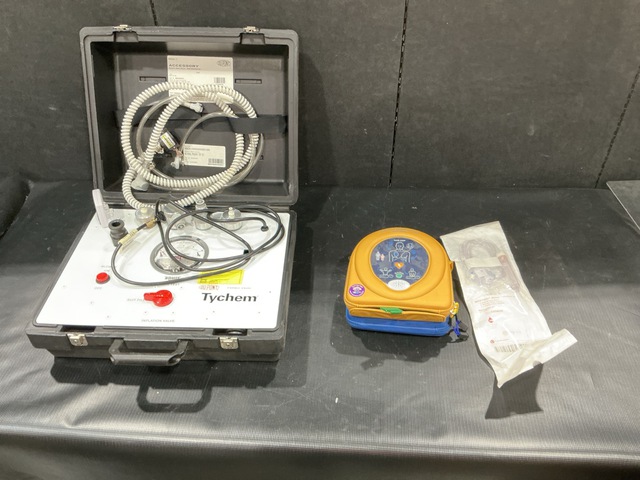 (3) Universal Pressure Test Kits, (1) External Defibrillator & Assorted Items (3) Universal Pressure Test Kits, (1) External Defibrillator & Assorted Items