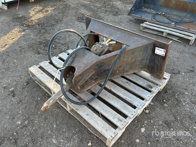 Brise-roche pour chargeuse