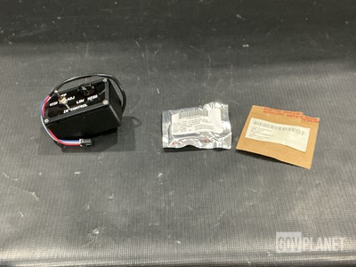 (1) Wiring Harness, (1) Battery Charger, (2) Brackets & Assorted Items