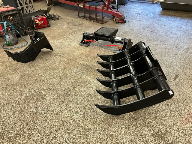 Quantity of Skid Steer Adapter, Root Rake, & Stump Ripper (Unused)