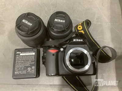 (1) Floodlight, (1) Projector, (1) Digital Camera& Assorted Items