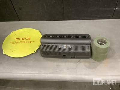 (1) Adaptive Battery Charger, (1) Access Cover & Assorted Items