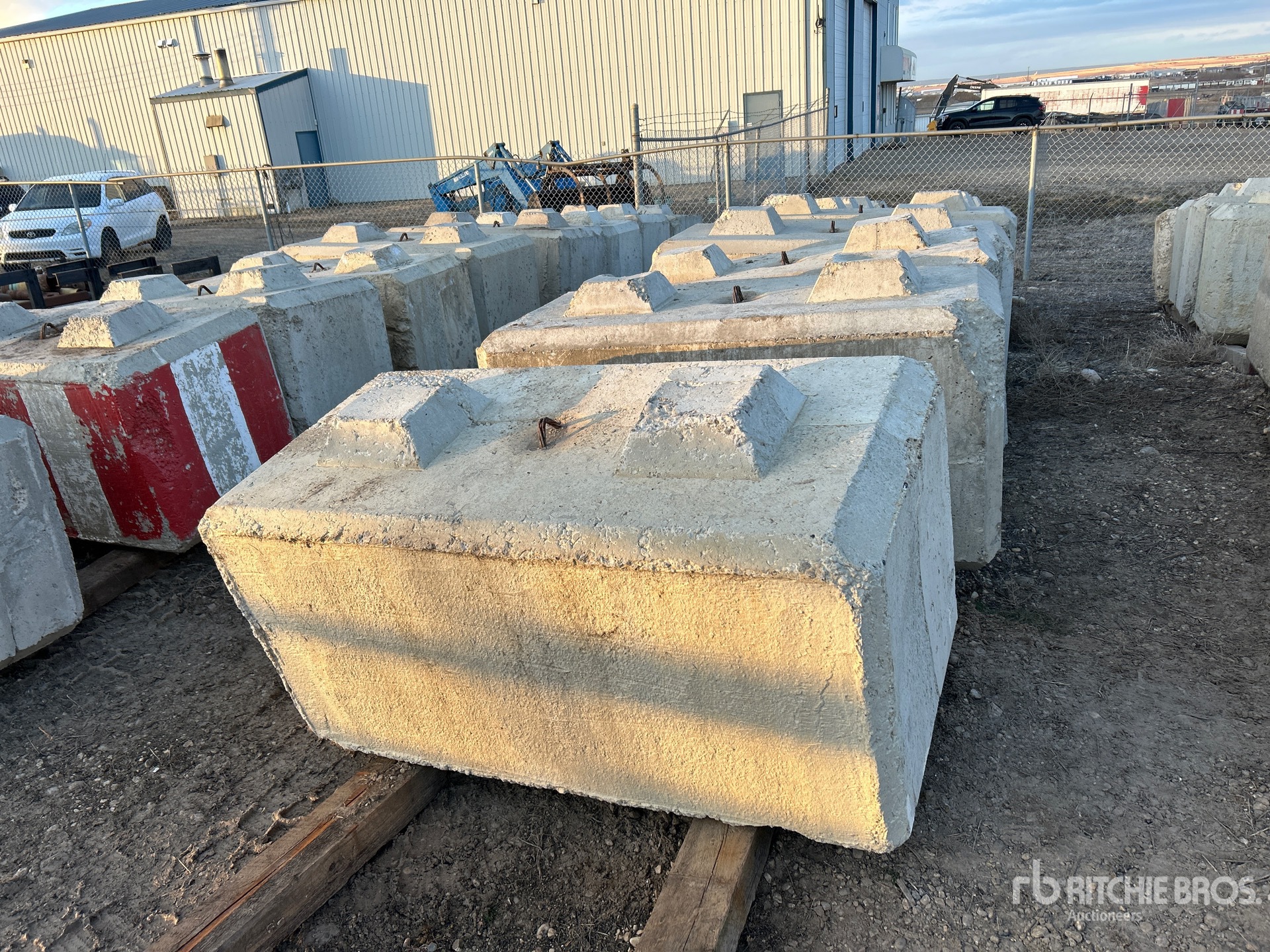 Quantity of (9) 5 ft x 2 ft 6 in Concrete Barrier