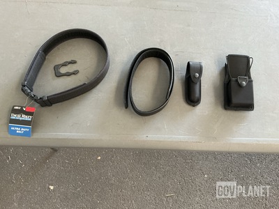 (390) Light Cases, (246) Radio Pouches, (180) Ultra Duty Belts & Assorted Items