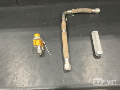 (1) Hose Assembly, (8) Filters, (1) Coupling Assembly & Assorted Items