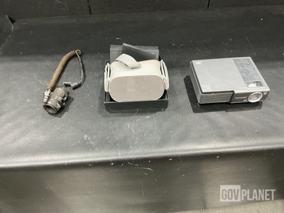 (1) Vehicular Utility Light, (9) VR Headsets, (13) Projectors & Assorted Items