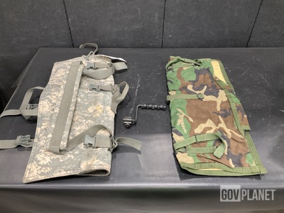 (6) Machine Gun Barrel Cases, (7) Rifle Grips & Assorted Items