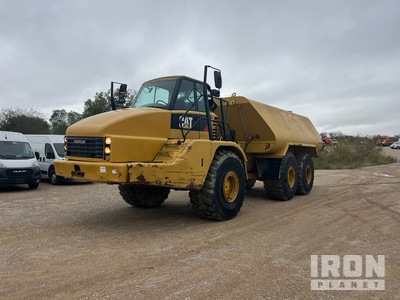 Cat 740 8000 gal 6x6 Articulated Water Truck