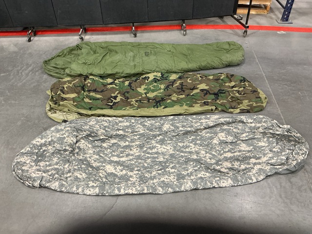 (21) Bivy Covers, (12) Sleeping Bags, (24) Stuff Sacks & Assorted Items (21) Bivy Covers, (12) Sleeping Bags, (24) Stuff Sacks & Assorted Items