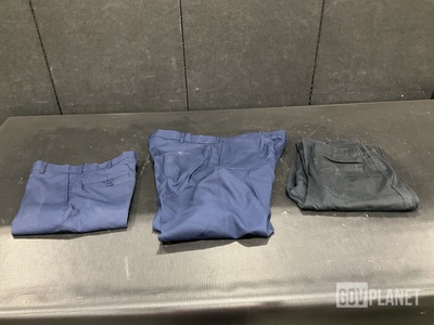 (129) Pairs of Trousers, (58) Pairs of Slacks (4) Duffel Bags & Assorted Items