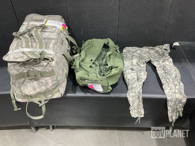 (1) Individual Bag, (30) Duffel Bags, (9) Wet Weather Trousers & Assorted Items