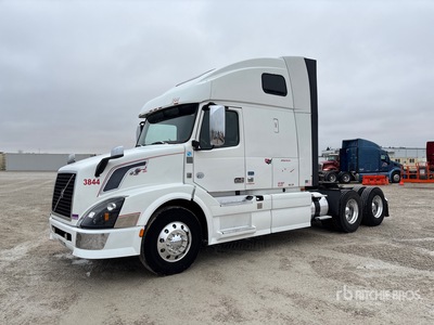 2015 Volvo VNL670 6x4 T/A Sleeper Truck Tractor