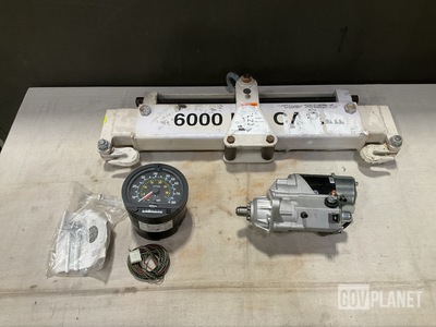 (1) Load Leveler, (1) Tachograph Kit, (1) Starter & Assorted Items