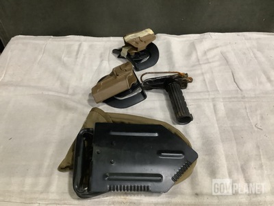 (17) Entrenching Tools, (38) Holsters, (1) Shoulder Stock & Assorted Items