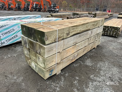 Quantity of (12) 10 in x12 in x10 ft Surplus Pressure Treated Timmerhout