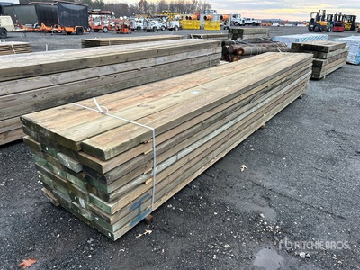 Quantity of (36) 3 in x 10 in x 18 ft Surplus Pressure Treated Lumber
