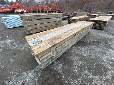 Quantity of (12) 6 in x 12 in x 12 ft Surplus Pressure Treated Timmerhout
