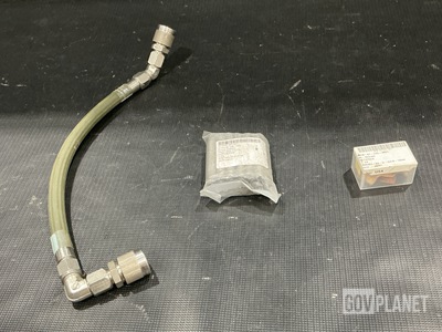 (4) Hose Assemblies, (4) Valve Caps, (14) Nipples & Assorted Items