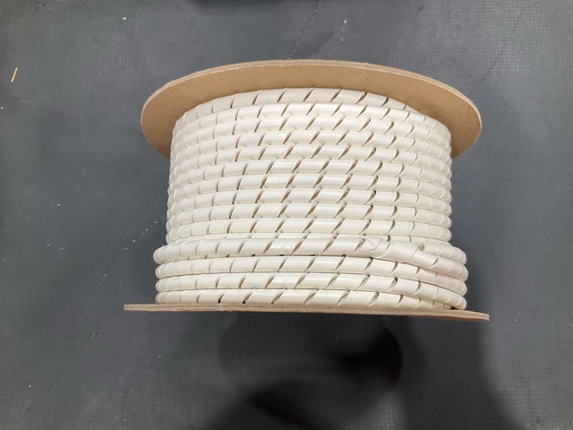 (1,300') of M M Newman HT-2091 Spiral Wrap Plastic Tubing (1,300') of M M Newman HT-2091 Spiral Wrap Plastic Tubing