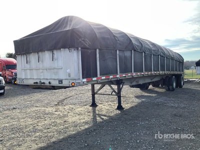 2005 Reitnouer 40000 lb 48 ft T/A Spread Axle Flatbed Trailer