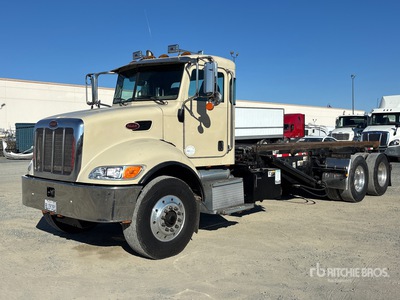 2005 Peterbilt 335 6x4 Roll-Off Truck